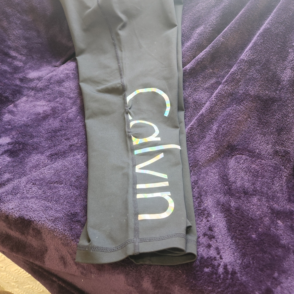 Calvin Klein 20" Cropped Black Leggings with Iridescent "CALVIN" Logo - Picture 7 of 8
